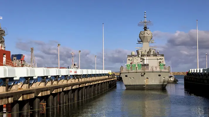 Navy vessel leaving the Syncrolift at BAE Henderson shipyard