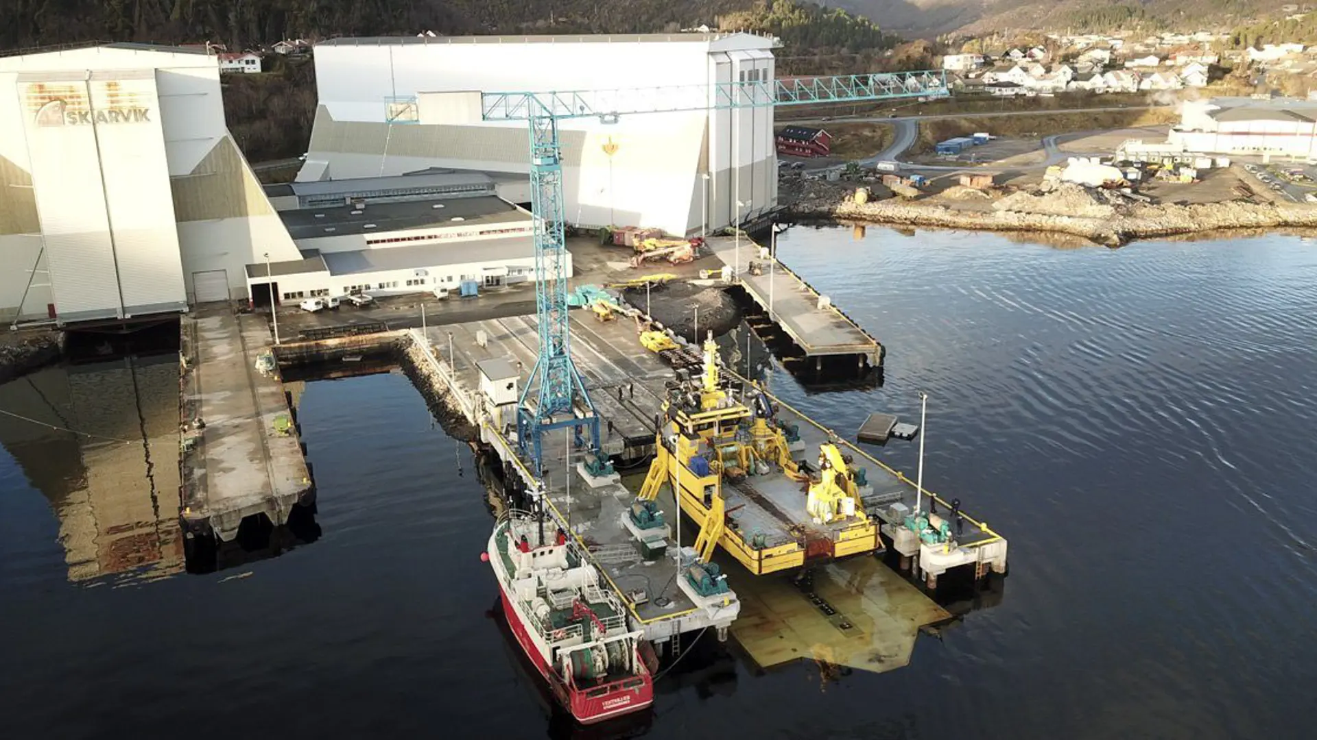 Aerial photo of a syncrolift with side support arms at Skarvik shipyard